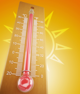 Thermometer graphic with illustrated sun behind it. 