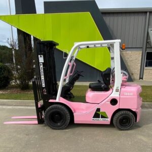 Pink Toyota forklift with pink fork for breast cancer awareness. 