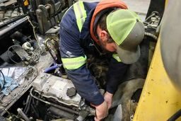 A service tech performing preventative maintenance. 