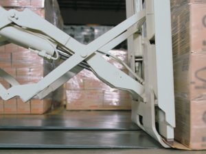 A slip sheet and push-pull forklift attachment type